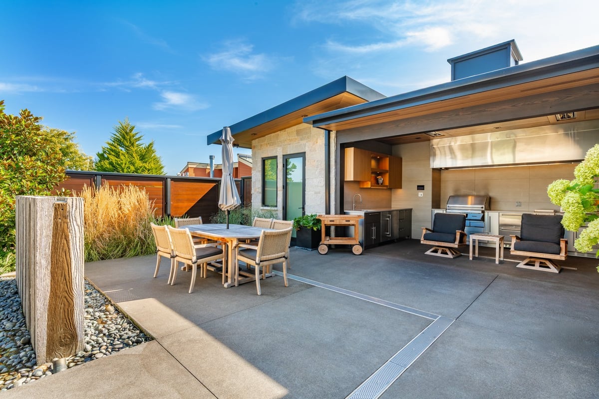 Luxury mountain modern home with ocean front deck, swimming pool, and outdoor living area